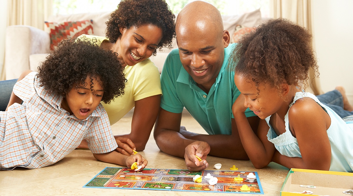 Family playing board games