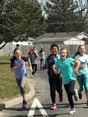 Kids at Harrison Hill run outside