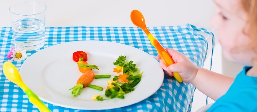 Small veggies on a child's plate