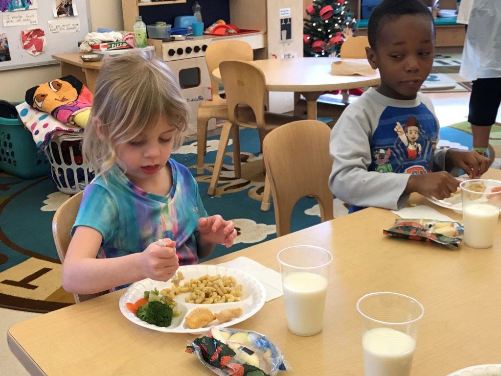 Pre-K students at Day Early Learning at Ft. Harrison eat a balanced lunch together