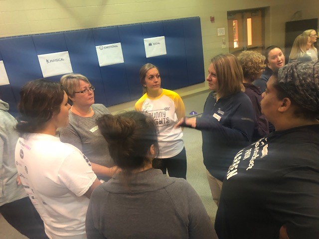 Warren teachers learn how to create active recess times and teach conflict resolution skills in a workshop given by Playworks