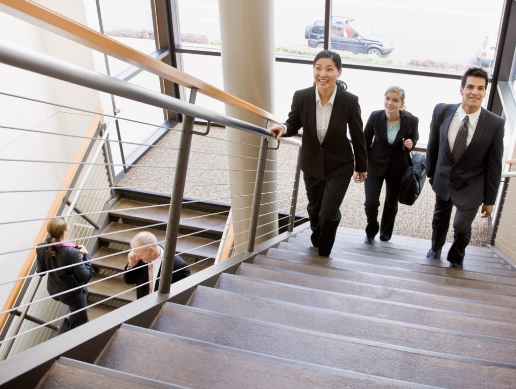 Business people taking the stairs