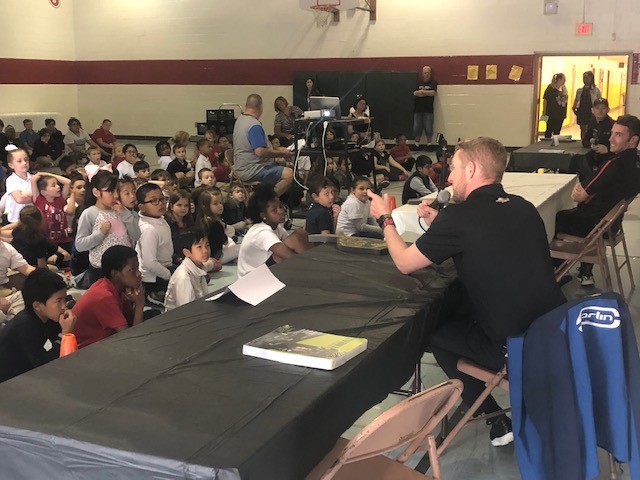 Indy 500 driver Charlie Kimball shares healthy tips with school kids