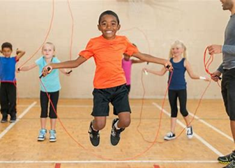 Kids jumping rope in PE class

