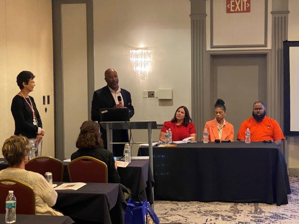 Award winner Dr. Young is joined by his wellness team in a conference breakout session moderated by Jump IN's Julie Burns